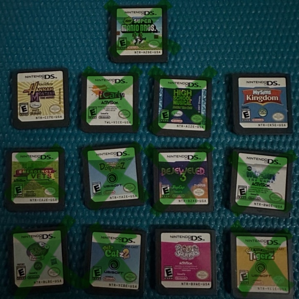 3 games: Hannah Montana, Squinkies, and My Sims